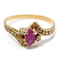 Anel em ouro 18k com diamantes e rubi