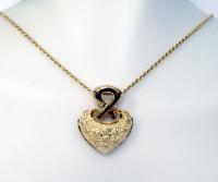 Cora��o em ouro amarelo 18k com brilhantes