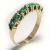 Meia Alian�a de esmeraldas em ouro amarelo 18k
