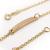 Pulseira infantil de chapa em ouro amarelo 18k