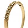 Meia alian�a de brilhantes em ouro 18k