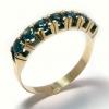Meia Alian�a de safira azul em ouro 18k